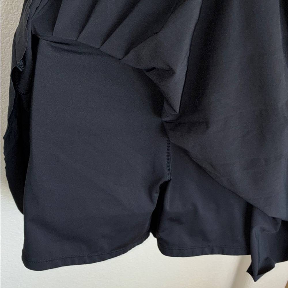 ATHLETA Black Pleated Mini Skirt with built in shorts. L - Picture 7 of 14